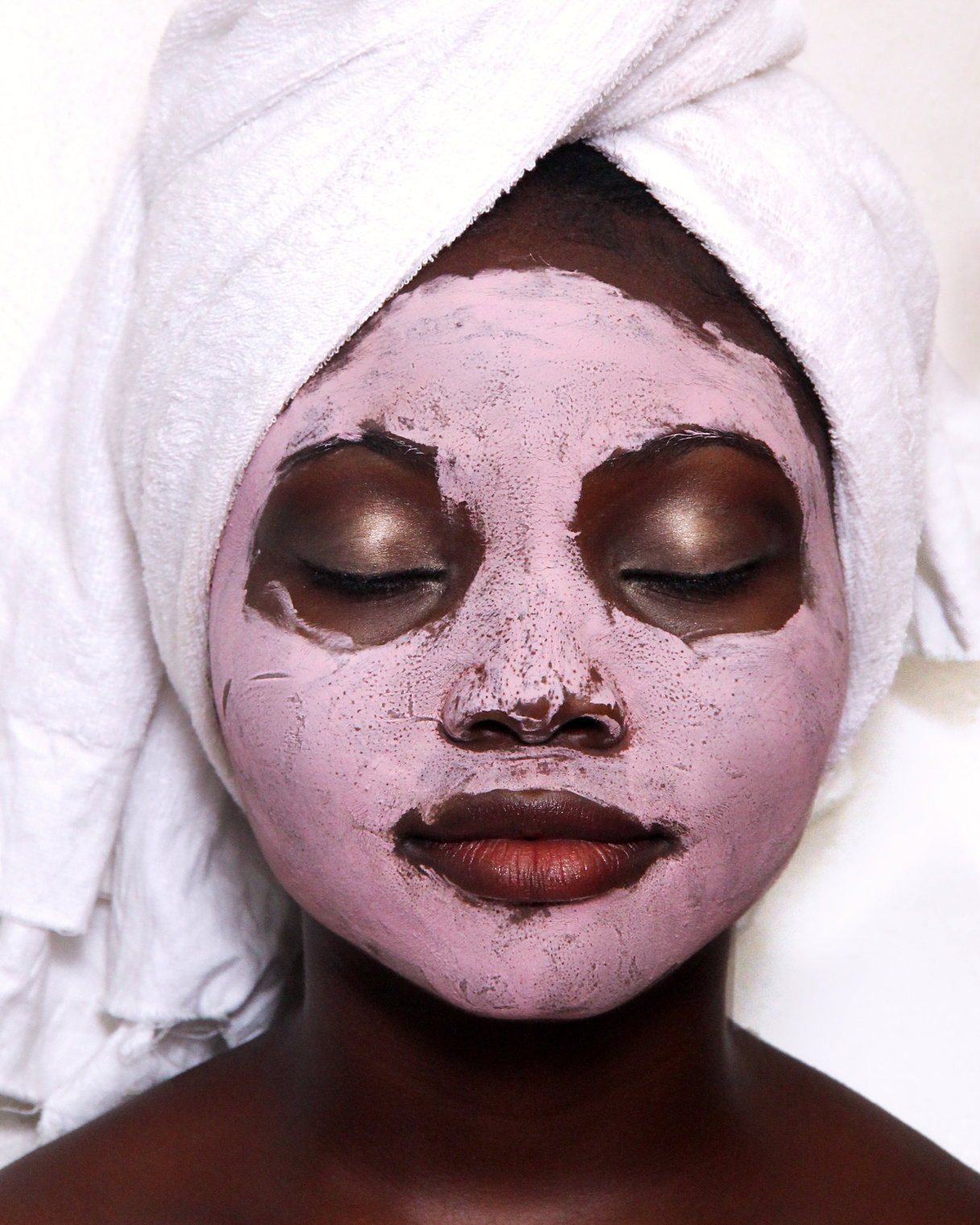 Woman With Pink Facial Mask